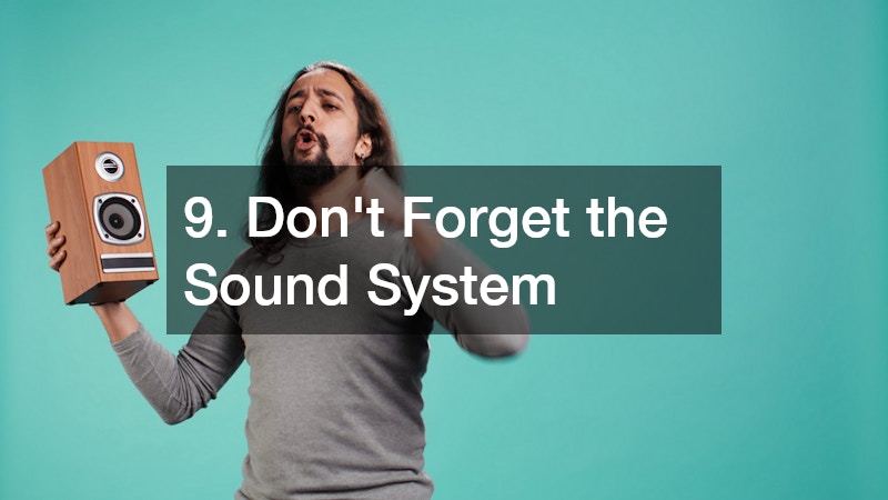 a man holding a speaker